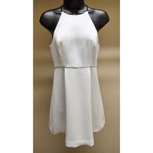 BCBGeneration white mini dress with high neck and black straps Size 2